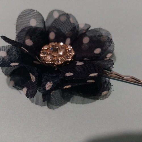 Hair accessory with blue and white flower and rhinestones