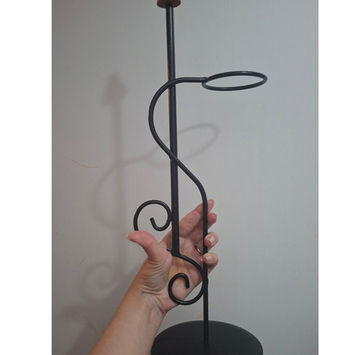 Black wrought iron metal decor stand with wooden detail, very good condition