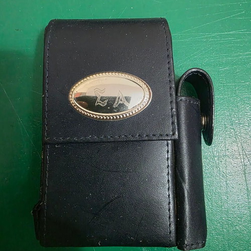 Leather tobacco case with silver frame and compartments