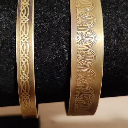 Bracelets set of 2 bronze with engraving like new