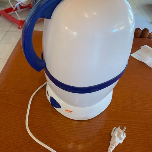 Nuk bottle and pacifier sterilizer used