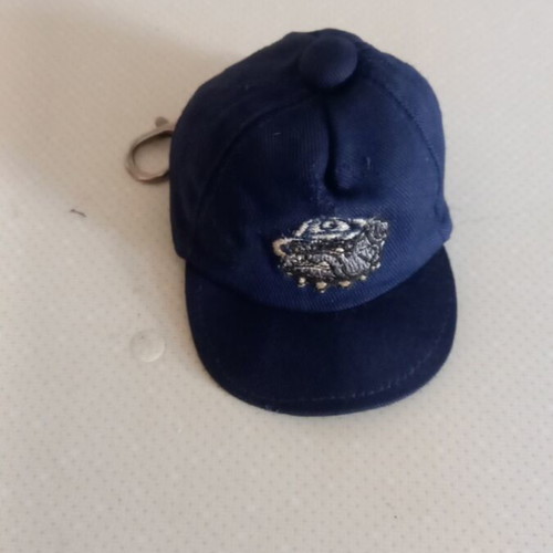 Collectible keychain in hat shape like new