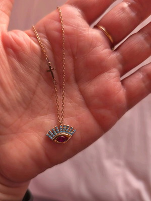 Women's necklace with eye pendant and cross in rose gold tone, like new