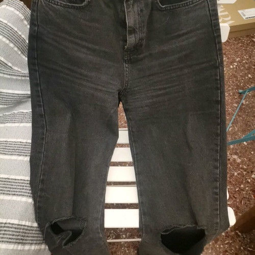 Stradivarius women's dark denim jeans used with knee rips, size S