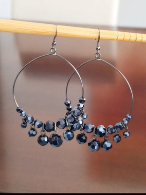 Hoop earrings like new with black shiny beads