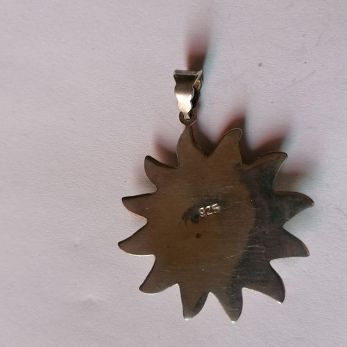 Silver 925 sun pendant new with embossed face