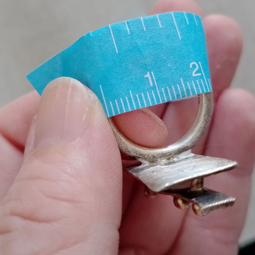 Statement two-tone ring used with layers, silver and gold colors