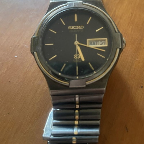 Seiko SQ100 Quartz vintage collectible watch