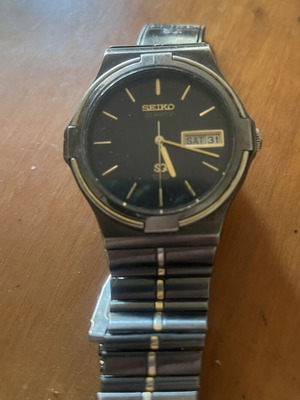 Seiko SQ100 Quartz vintage collectible watch