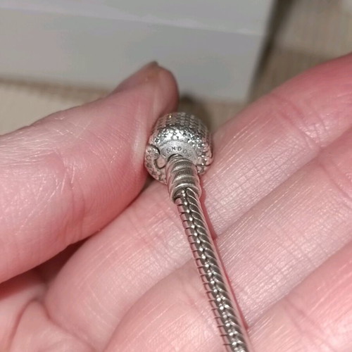 Pandora silver bracelet with 11 charms and collectible clasp, like new