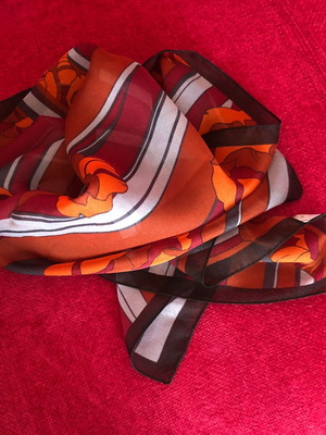 Scarf used in brown and orange tones