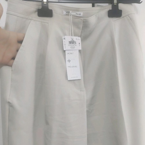 Ecru office pants medium new with box