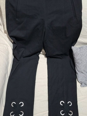 Black H&M evening pants like new with bows on the cuffs size M
