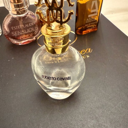 Collection of 11 authentic miniature perfumes like new