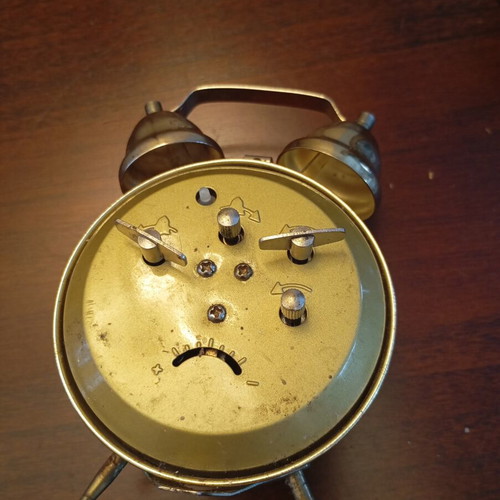 Vintage table clock alarm with natural patina used