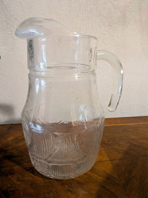 Glass jug used with handle
