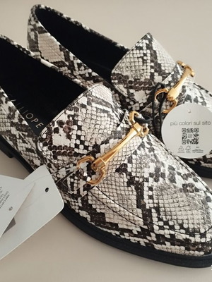 Calliope black and white moccasins new with tag
