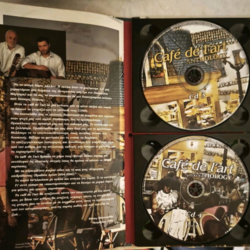 Cafe de l'art CD used with worn packaging