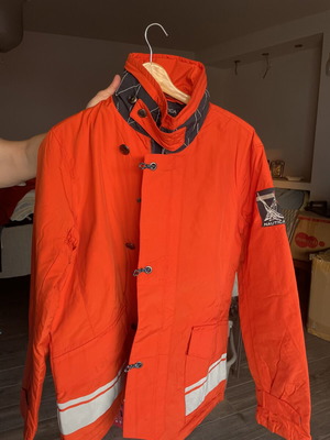 Nautica waterproof orange jacket with reflective lines