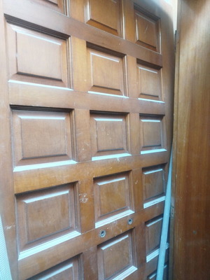 Entrance door used, heavy wooden, size 2.10 x 0.92 m