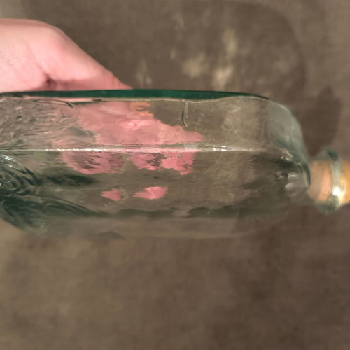Bottle with cork made of recycled glass like new