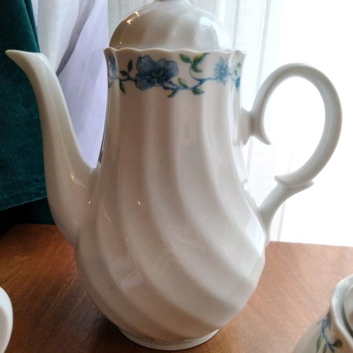 Vintage tea and coffee set in white porcelain like new