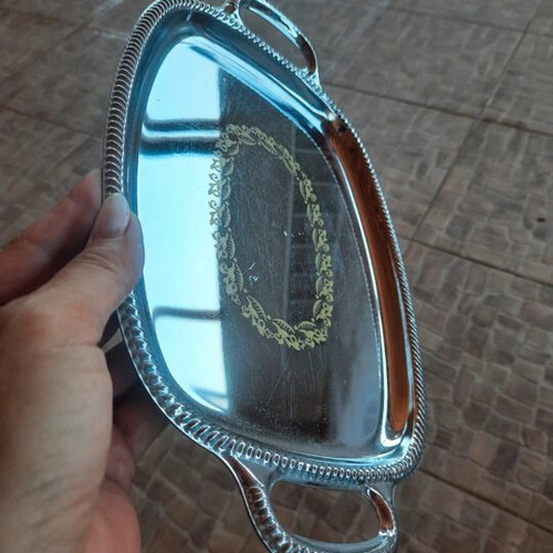 Small stainless steel tray like new with decorative design