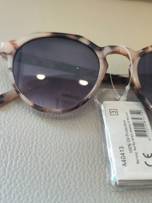 Sunglasses new, beige color