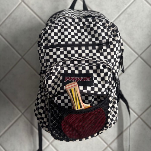 Jansport black and white checkerboard backpack with laptop compartment