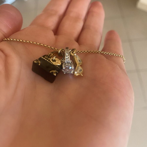 Juicy Couture necklace with gold chain and adjustable rings, like new