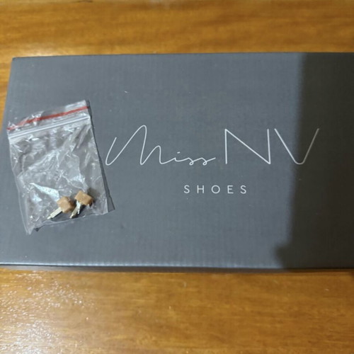 Envie white sandals with unique heel