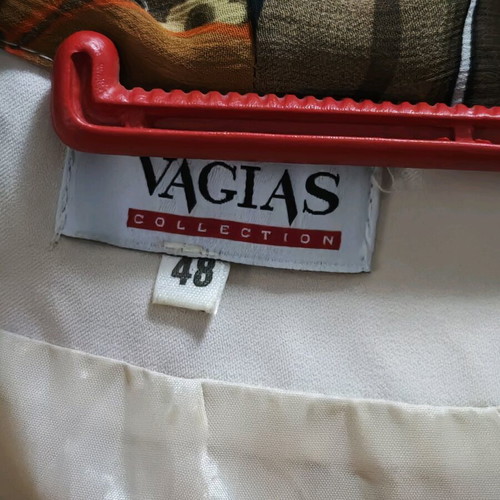 Elegant Vagias Collection suit like new with floral details