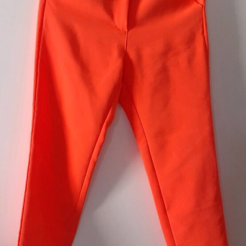 Selestino orange pants size M like new with two front pockets
