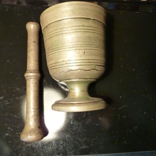 Antique bronze mortar with pestle used