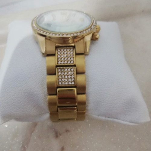 Revello women's watch new, gold color