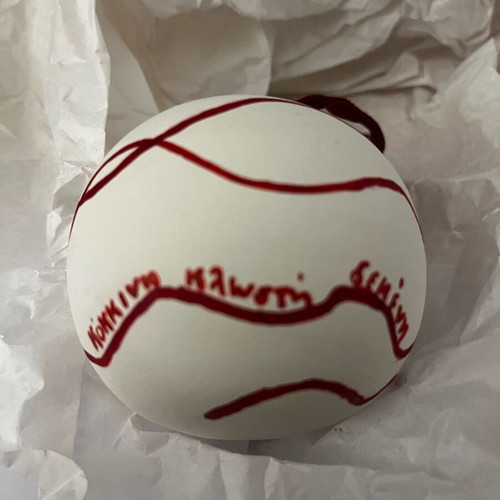 Christmas ceramic ball new with red thread