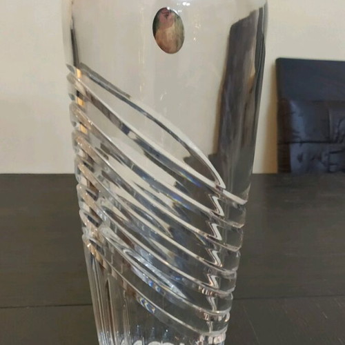 Decorative crystal vase used with small chip on rim