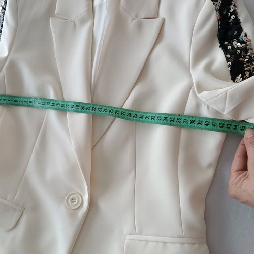 Ivory blazer On Line like new with double black-silver sequins on sleeves