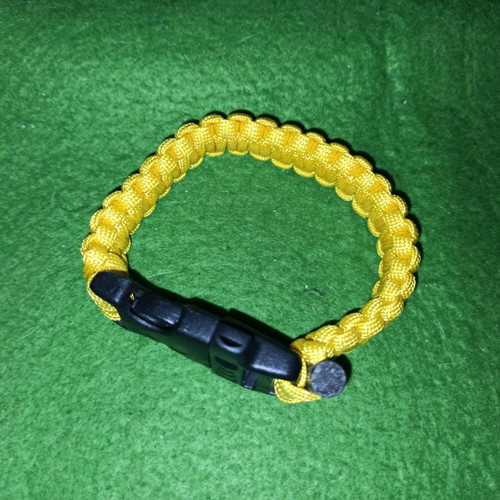 Paracord bracelet survival with cord, whistle and fire starter