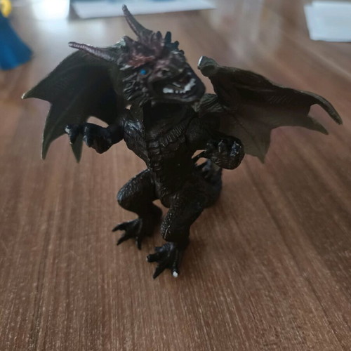 Dragon used, 11cm tall, missing finger on right hand
