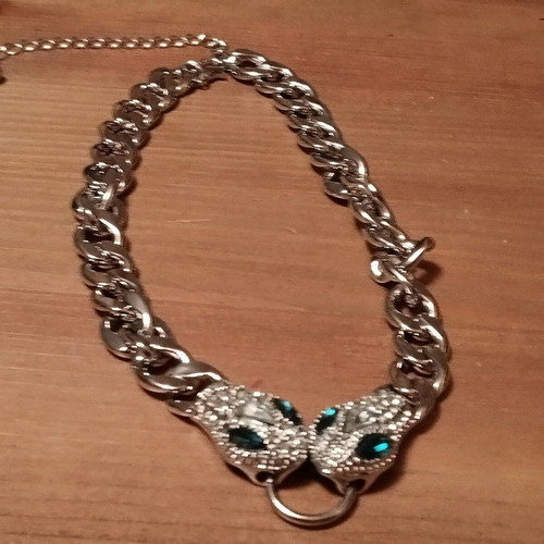 Choker necklace solid with snakes in like new condition