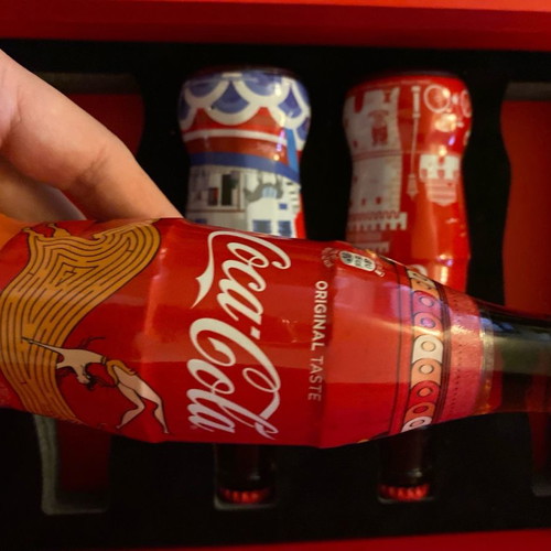 Collectible bottles and book 50 years Coca Cola new