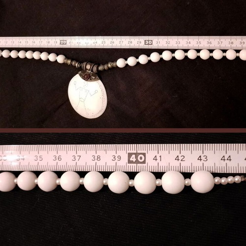 Handmade necklace with white pearls and bone charm used
