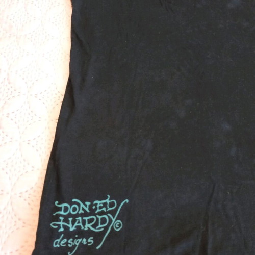 Ed Hardy T-shirt used in good condition, size S, black with multicolor design