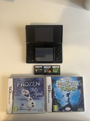 Nintendo DSi black matte console used with 5 games