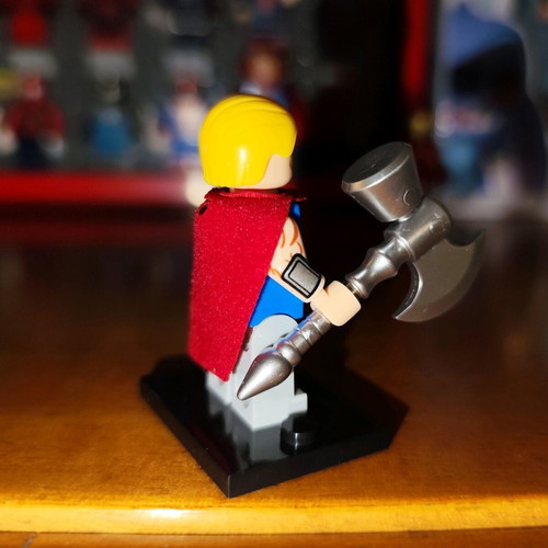 Unworthy Thor Lego figure like new with stand, cape, and axe