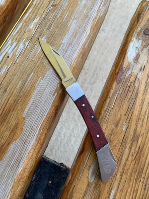 Lockback folding knife used, unsharpened blade