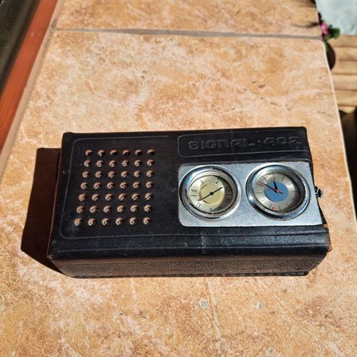 Signal 402 portable Soviet radio with clock used