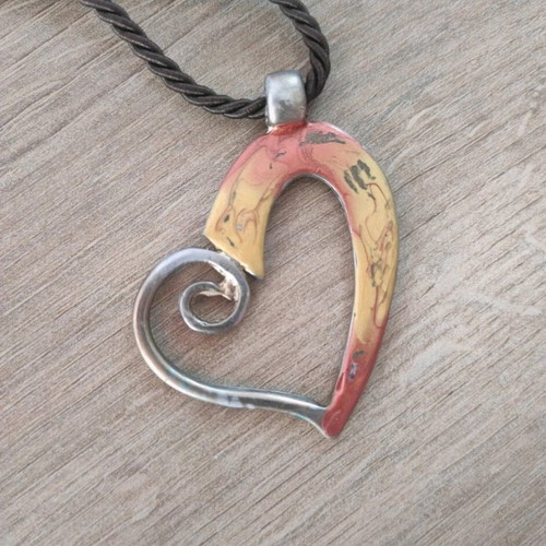 Heart pendant with long cord and metal gold heart like new