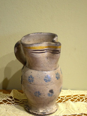 Ceramic jug old used from Apulia with blue flower details